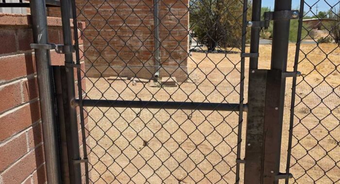 Snake Fencing On Chainlink Fence